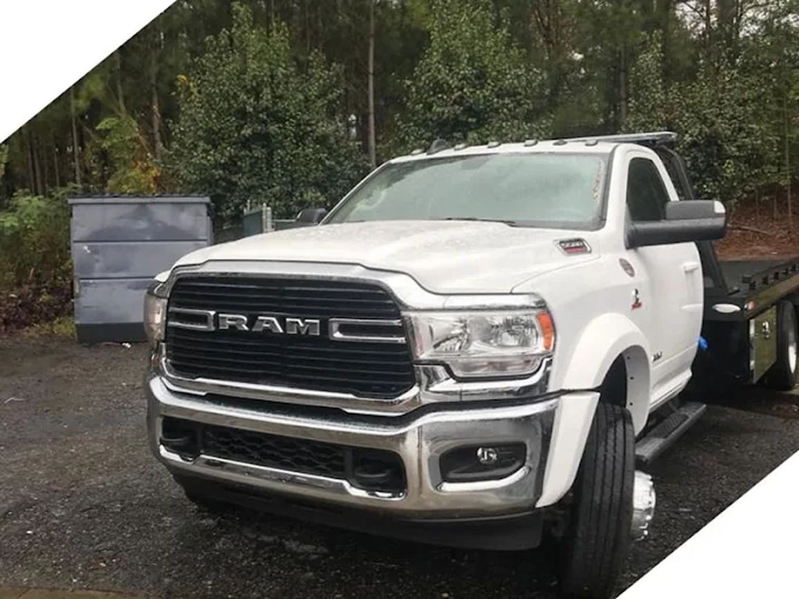 White Ram truck parked in a lot